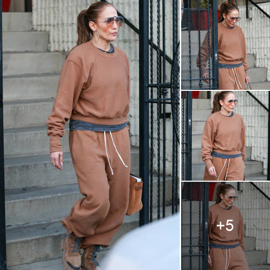 Jennifer Lopez’s Casual Chic Look: A Simple Hoodie Paired with Jogger Pants for Work